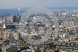 View of French city of Paris with factories and houses