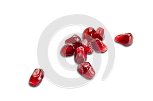 View of fresh ripe pomegranate seeds isolated on white background