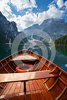 A view frome the inside of the little boat in Braies Lake, Dolomites, Italy