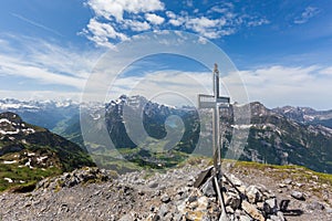 View from Fronalpstock mountain to glaernisch, glarus, lake kloental photo
