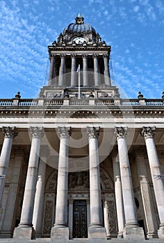 View of the front of Leeds City hall in west yorkshire showing the clock tower