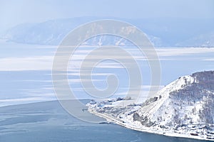 View of Frozen Lake Baikal and Angara River in Listvyanka, Russia