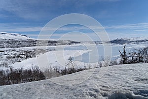 View of the frozen lake SlÃÂ¸ddfjorden near the village of HaugastÃÂ¸l, in the municipality of Hol, Viken County, Norway,