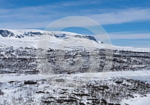 View of the frozen lake SlÃÂ¸ddfjorden near the village of HaugastÃÂ¸l, in the municipality of Hol, Viken County, Norway photo