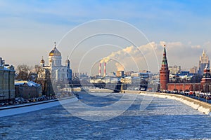 View of frozen Moskva river near the Moscow Kremlin in sunny winter day