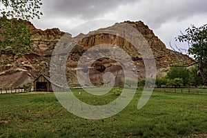 View of Fruita Barn in rocky landscape, Capitol Reef, USA