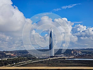 view of The futuristic Mohammed VI Tower It s the third tallest building in Africa. against sky and clouds - Rabat, Morocco