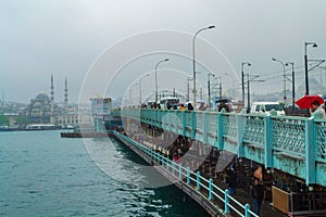 View of Galata Bridge on rainy spring day view Istanbul Turkey