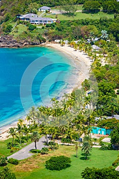 View of Galleon Beach from Shirley Heights, Antigua, paradise bay at tropical island in the Caribbean Sea photo