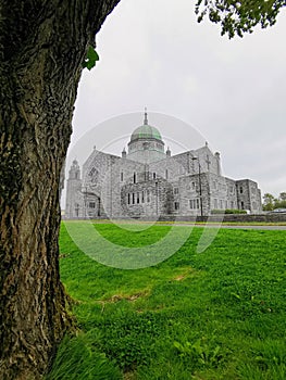 View of Galway Cathedral with green lawn in the foreground. Galway, Ireland