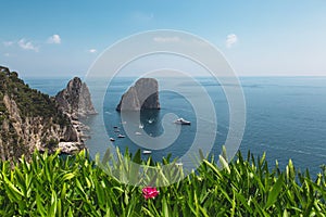 View from the Gardens of Augustus on Capri coast and Faraglioni Rocks. Italy