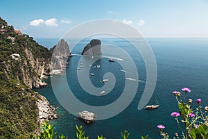 View from the Gardens of Augustus on Capri coast and Faraglioni Rocks. Italy