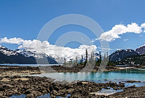 view at the lake beautiful sunny morning with clouds on bluew sky photo