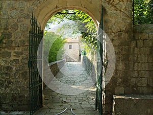 View from the gate to the entrance to the church