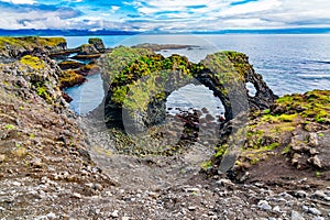 View of Gatklettur Arch Rocks Formation photo