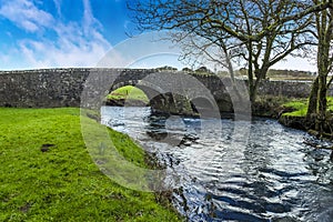 A view of the Gelli bridge that spans the River Syfynwy, Wales photo