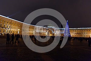 View of General Staff Building and Christmas Tree on Palace square at night. Saint Petersburg. Russia