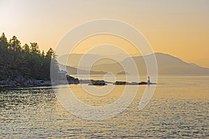 View of the Georgia Strait at Vancouver Horseshoe bay at sunset