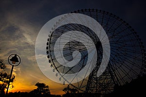 View of Giant wheel with sunset background