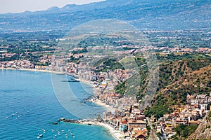 View of Giardini Naxos town on Ionian Sea beach