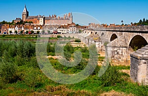 View of Gien with the castle and the old bridge across Loire river, France