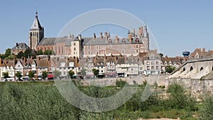 View of Gien with the castle and the old bridge across the Loire river, France