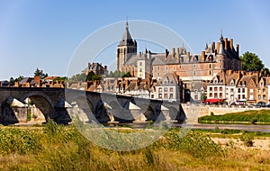 View of Gien with the castle and the old bridge across Loire river, France