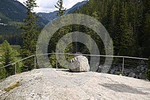 View of the Glacial erratic in Cavaglia Glacier garden