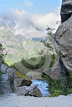 View of the glacial river Briksdalselva rising from the Briksdalsbreen glacier in Jostedalsbreen Nasjonalpark, Norway, Europe