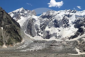 View of the glacier Mizhirgi. The Northern wall of the Mijirghi massif. Caucasus mountains