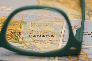 View through glasses, of the state of Canada on the map of america