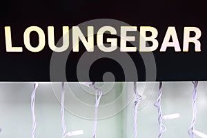View of glowing inscription loungebar