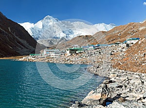 View of Gokyo lake and village with mount Cho Oyu