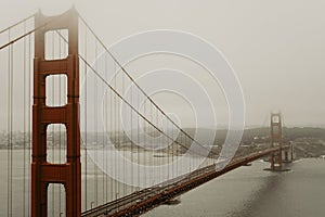 View of Golden Gate Bridge with fog and overcast weather