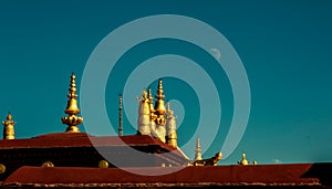 View of golden ornated towers at the Jokhang Temple in Lhasa, Tibet, China