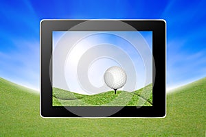 View of golf ball on golf course from tablet
