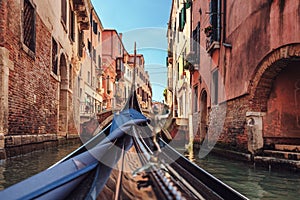 View from gondola during the ride through the canals of Venice i