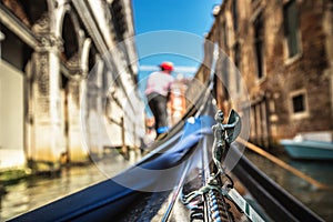 View from gondola during the ride through the canals of Venice i