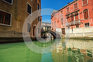 View from gondola during the ride through the canals of Venice i