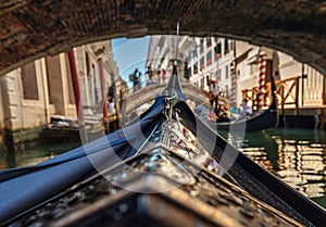 View from gondola during the ride through the canals of Venice i