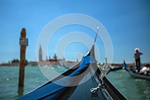 View from gondola during the ride through the canals of Venice i