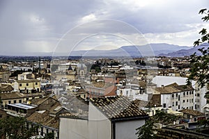 View of Granada from the historic working-class district of Albayzin, a neighborhood with a wide variety of religions and origins