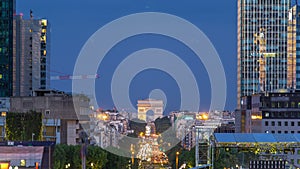 View from Grand Arch in Defense business district to the Arc de Triumph day to night timelapse, Paris, France