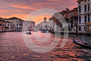 View of Grand Canal from Bridge Ponte dell`Accademia on sunset. Venice. Italy