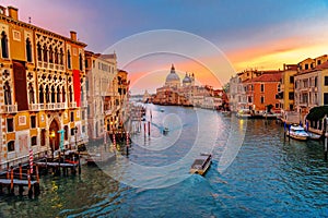 View of Grand Canal from Bridge Ponte dell`Accademia on sunset. Venice. Italy