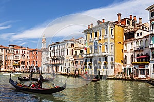 View on the Grand canal and gondolas with tourists, Venice,