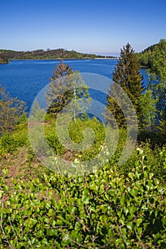 View of Granestausee reservoir and forest at Harz Mountains National Park, Germany photo