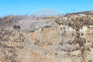 View of granite quarry. Pumping groundwater from quarry