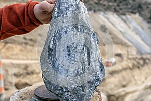 View of the graphite specimen. It is a crystalline form of the element carbon with its atoms arranged in a hexagonal structure. photo