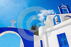 A view of a Greek church with iconic blue colors on Greek island